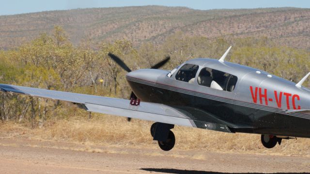 Mooney M-20 (VH-VTC) - Emma Gorge private airstrip in the Kimberly Ranges Western Australia.  Piloted by Terry Casey.