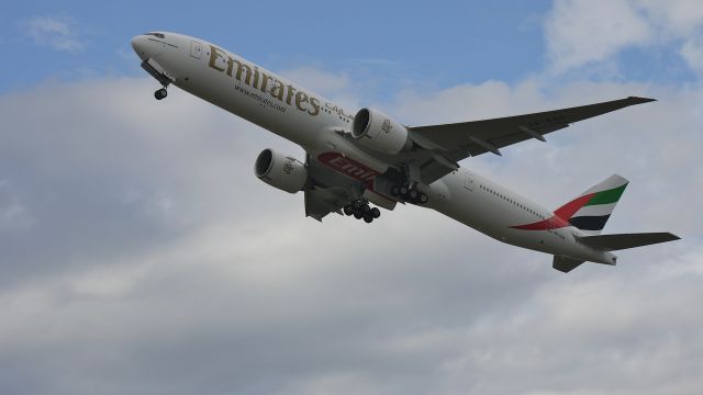 BOEING 777-300 (A6-EGG) - UAE777 a new B777-300ER departs runway 16R on its delivery flight to Dubai Intl (OMDB/DXB).  Photographed 10/11/11.