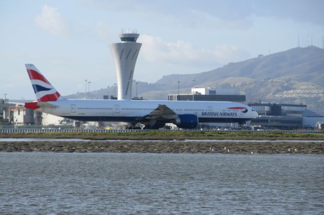 BOEING 777-300ER (G-STBK) - Taken at San Francisco International. See the 'South San Francisco' sign to the right of the aircraft.