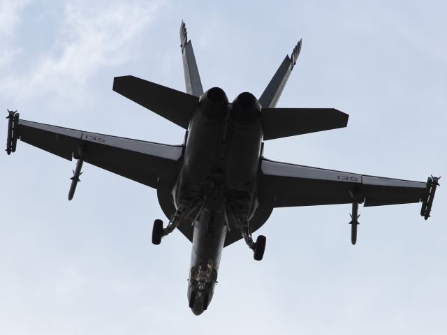 — — - Looks lethal, even in silouette! A Boeing FA-18F Super Hornet, approaching Farnborough Airport.