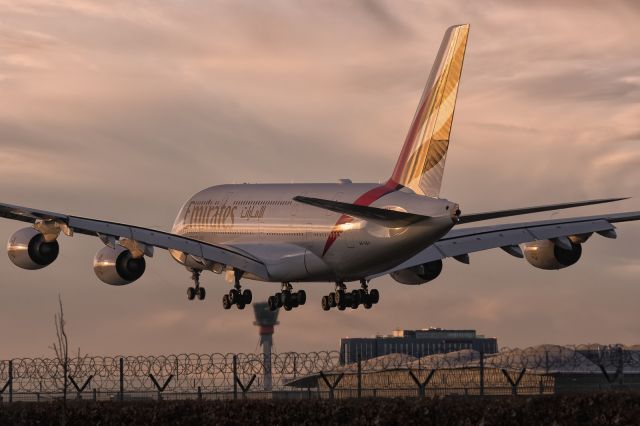 Airbus A380-800 (A6-EEY) - 2nd Feb., 2022: Gliding over the piano keyboards for touch down on runway 27L.