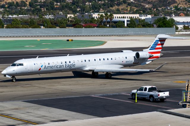 Canadair Regional Jet CRJ-900 (N947LR) - Preparing for departure goes this Air Shuttle flight back to Phoenix