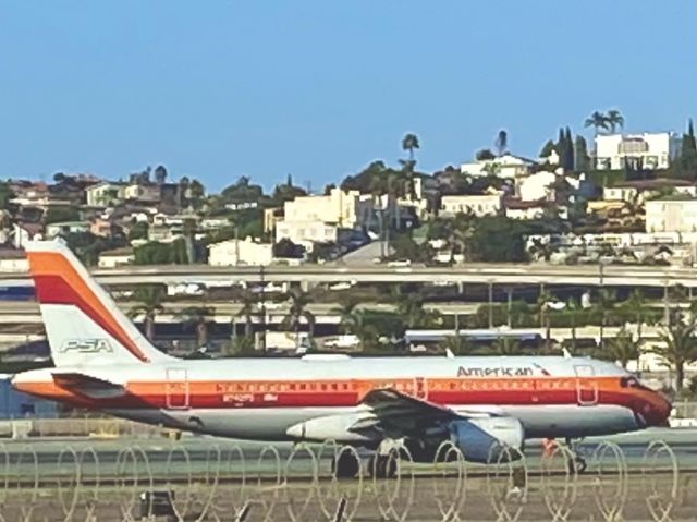 Airbus A319 (N742PS) - Finally spotted back in her hometown (SAN), 27Sept20!  Serving us the PSA ‘Rooster Tail’ retrojet livery that graced PSA’s fleet in the late 70’s & 80’s.