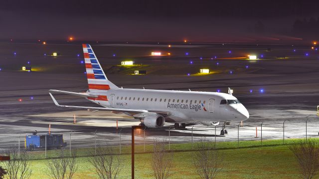 Embraer 175 (N110HQ) - Republic Airways (American Eagle) Embraer ERJ-175 (N110HQ) parked on the RDU ramp near Terminal 1 on 11/26/2020 at 8:45 pm.