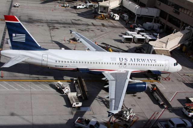 Airbus A320 (N621AW) - The parking ramp looks down on the USAir ramp.