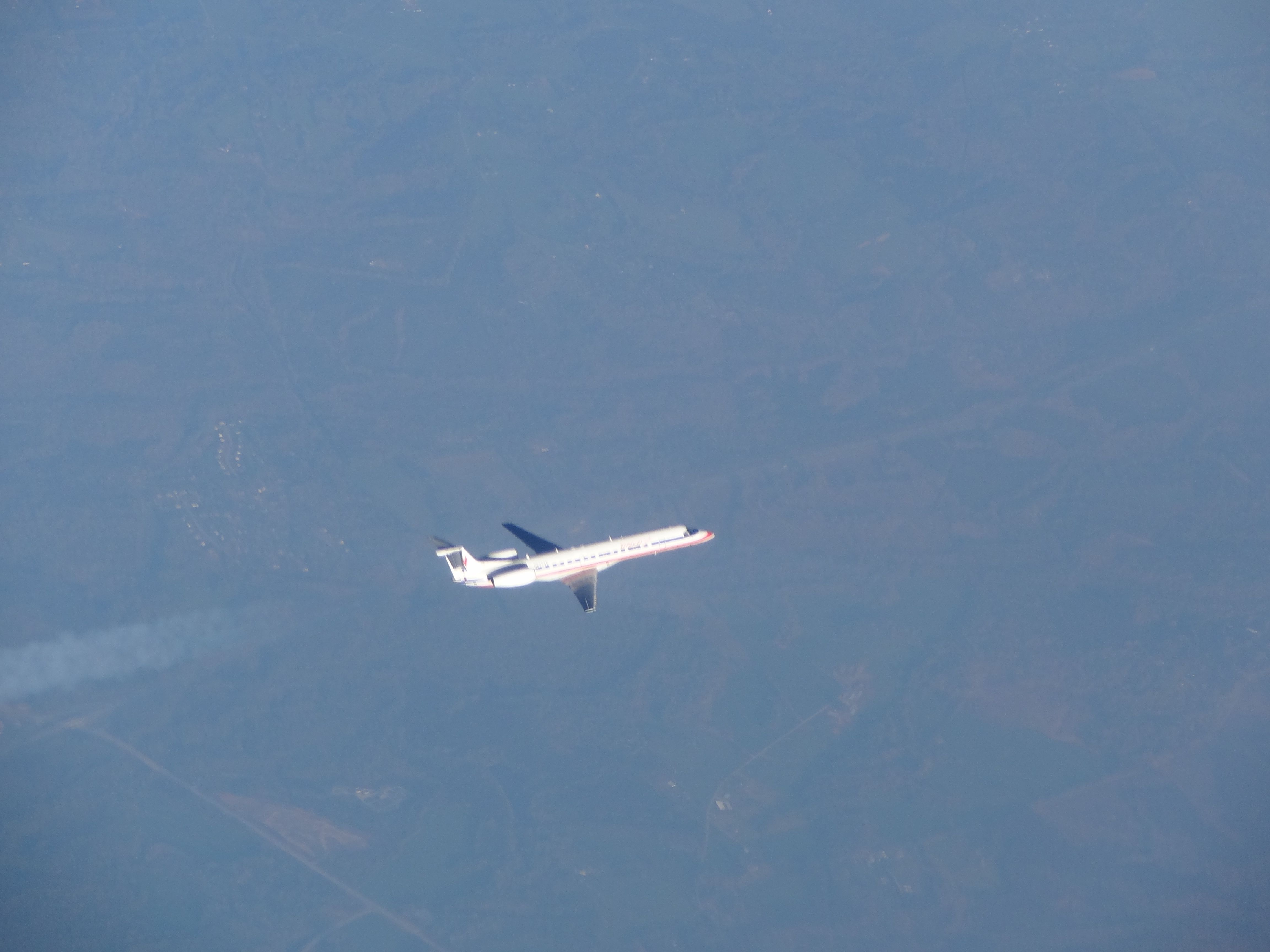 — — - American Eagle EMB 145s at 37000 feet with another one flying just below