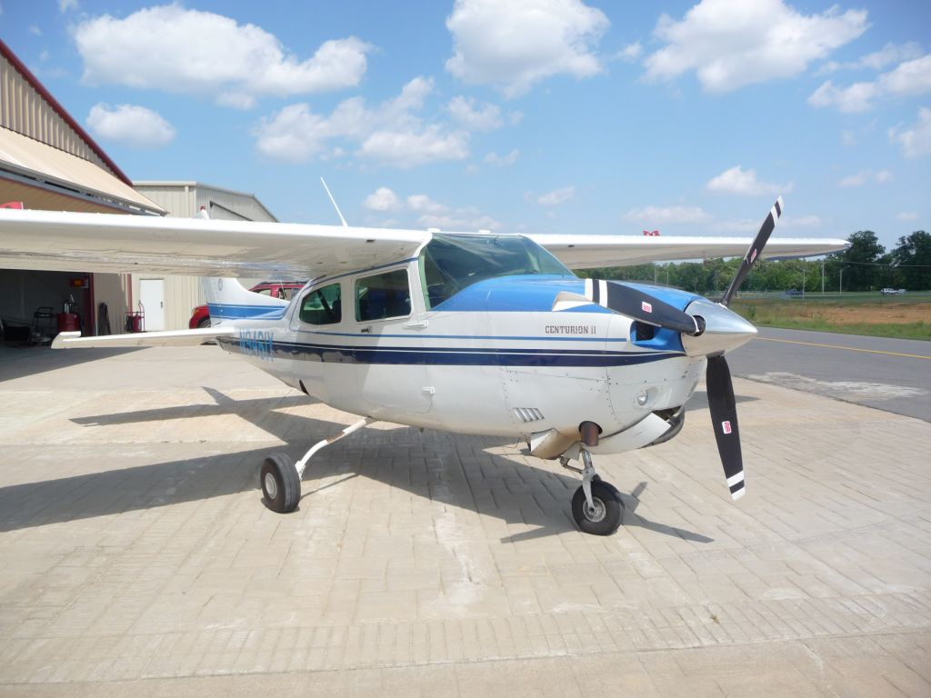 Cessna Centurion (N9461Y) - 1981 T210 Parked at the hanger at KSRC.