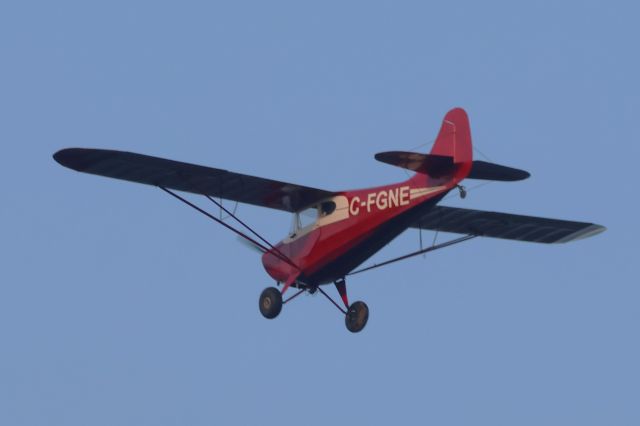 C-FGNE — - C-FGNE Aeronca Chief 11-BC Survolant le fleuve St-Laurent QC. à Lavaltrie le 13-07-2024 à 19:24