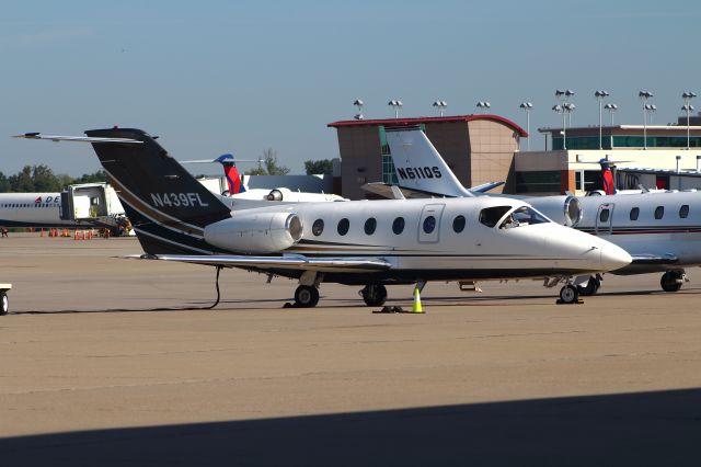 Beechcraft Beechjet (N439FL) - N439FL along side of N611QS at Tac-Air ramp getting ready for a customer.