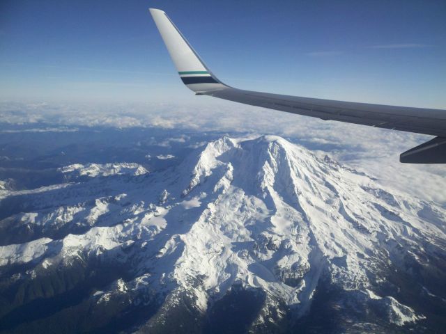 Boeing 737-800 — - Departure from Seattle, WA KSEA to Orlando, FL KMCO Flying over Mt. Rainier.