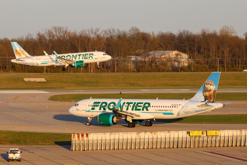 N336FR — - Frontier A320 holding short of 18L while another Frontier A320 lands on 18L