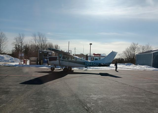 Cessna 206 Stationair — - 2025-02-12 Visit Maine. br /Fuel stop at Dexter.