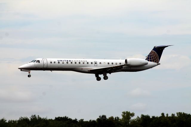 Embraer ERJ-145 (N10575) - "Acey" on short final for runway 24.