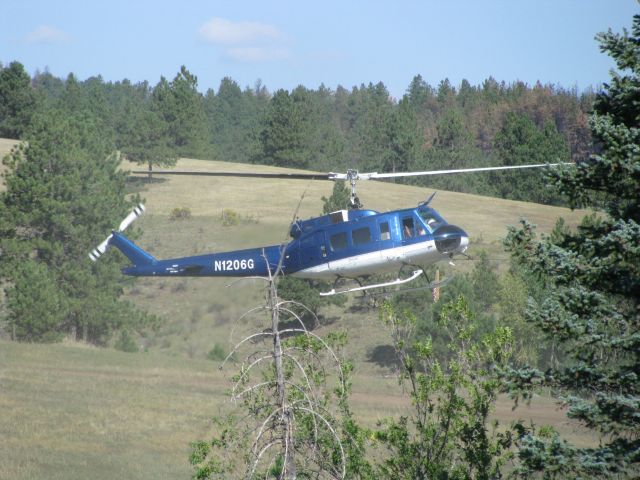 Bell UH-1V Iroquois (N1206G) - Reseed operations after High Park Fire. In Rist Canyon 9/1/12.