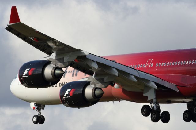 Airbus A340-600 — - Landing runway 027L at LHR.