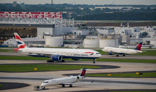 — — - BAW B773 (G-STBI) taxiing to the gate after arriving 8L from London surrounded by the hometown airline.br /6/17/17