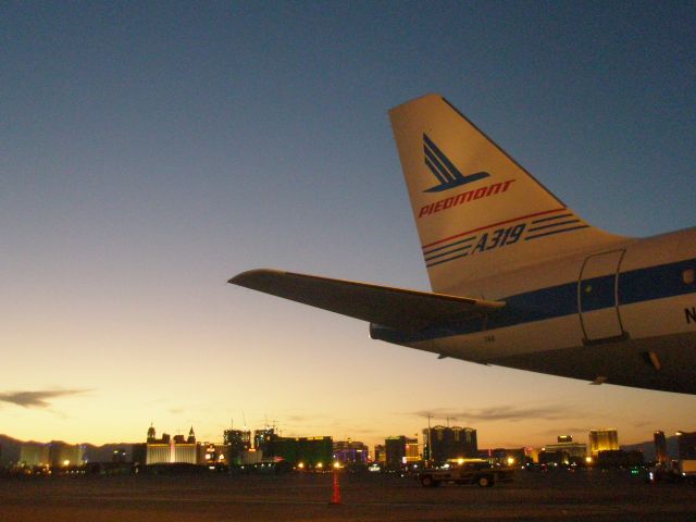 Airbus A319 (N744P) - Sunset on the " Piedmont Pacemaker"