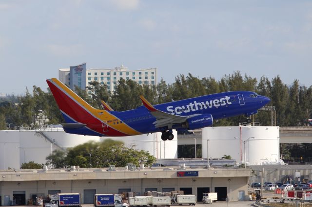 Boeing 737-700 (N907WN) - Southwest Airlines (WN) N907WN B737-7H4 [cn36619]br /Fort Lauderdale (FLL). Southwest Airlines flight WN3371 departs for Providence  T. F. Green International (PVD).br /Taken from Terminal 1 car park roof level br /2018 04 07br /a rel=nofollow href=http://alphayankee.smugmug.com/Airlines-and-Airliners-Portfolio/Airlines/AmericasAirlines/Southwest-Airlines-WNhttps://alphayankee.smugmug.com/Airlines-and-Airliners-Portfolio/Airlines/AmericasAirlines/Southwest-Airlines-WN/a