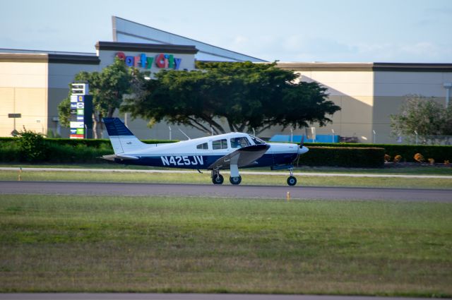 Piper Cherokee Arrow (N425JV) - Landing runway 5 at KFMY