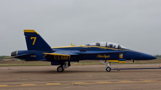 McDonnell Douglas FA-18 Hornet (16-3458) - Blue Angel 7 being towed by her crew chief to the alternate pad in case she is needed for the performance later in the day at the Heart Of Texas Airshow in Waco, TX, April 2018 (please view in "full" for best image quality)