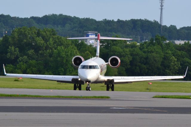 Canadair Regional Jet CRJ-700 (N520JG) -  JOE GIBBS RACING INC arriving at KJQF - 5/30/18