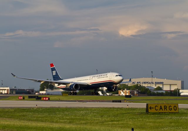 Airbus A330-300 (N275AY) - This big Airbus 330-300 is making an evening departure from runway 18L for a European destination from Charlotte, North Carolina USA