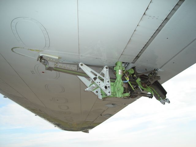 BOEING 737-600 — - Close-up of the hydraulic actuator for the flaps on a Boeing 737-600. The Canoe that covers the actuator normally has fallen off resulting in a 10 knot speed penalty for the aircraft. Picture taken at Fort McMurray Airport, Alberta, Canada