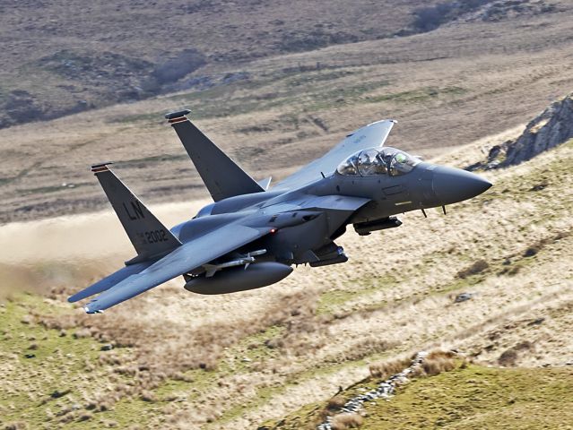 McDonnell Douglas F-15 Eagle (01-2002) - A successful day at the world-renowned Mach Loop, Cad West in Wales This is one of four F-15E Strike Eagles from the 48th Fighter Wing based at RAF Lakenheath screaming through the morning on 25 Apr 2023. We even got a wave from the WSO.