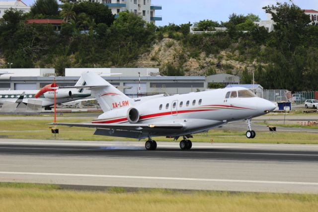 XA-LRM — - Hawker XA-LRM landing at TNCM St Maarten.br /Photo taken at El Zaphiro.