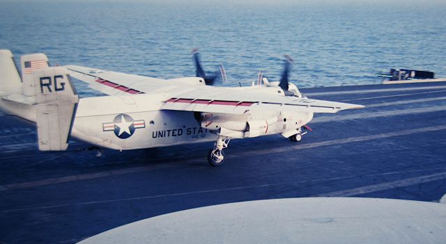 — — - VRC-50 C-2A takes a 3 wire aboard USS Kitty Hawk Yankee Station South China Sea 1967