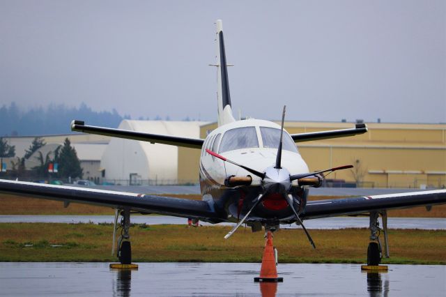 Socata TBM-700 (C-FABN) - TBM7 parked at FBO awaiting its passengers.