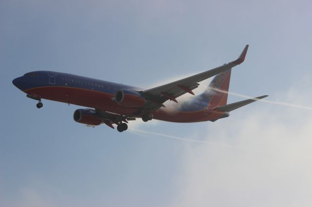 Boeing 737-800 (N8609A) - The morning fog was starting to clear which led to some great condensation!