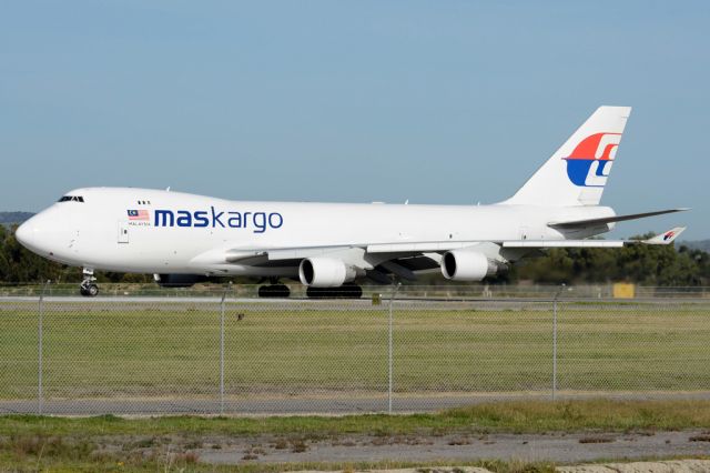 Boeing 747-200 (9M-MPR) - Rolling for take-off on runway 05, for flight home to Kuala Lumpur, Malaysia. Wednesday, 21st May 2014.