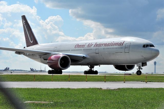 Boeing 777-200 (N819AX) - Dang chain link fence. This aircraft was within 100' of me. 09-17-21