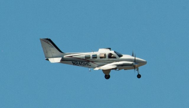 Beechcraft Baron (58) (N240HC) - Final for 27 at Carson City