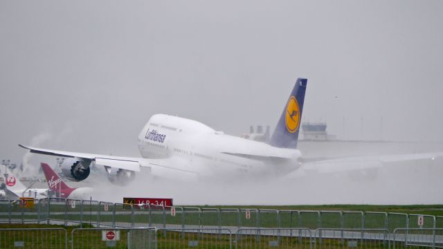 BOEING 747-8 (D-ABYS) - DLH9931 on rotation from Rwy 34L for its delivery flight to EDDF / FRA on 2/19/15. (ln 1512 / cn 37843).