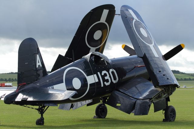 — — - Wings folded in Aircaft Carrier storage mode, a Vought F4U Corsair seen here at Duxford Air Museum in the morning on static dispaly. In the afternoon all that would change.