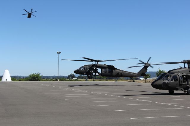 Sikorsky S-70 (82-0416) - Flight of 3 UH-60's departing Evergreen Aviation Museum 7-15-2013