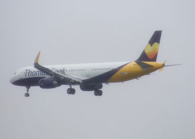 Airbus A321 (N901JT) - (3/19/2020) EX: G-TCVA of Thomas Cook, and Previously Monarch. Wears the TC/Monarch Hybrid Livery on final for 4R at BOS for delivery to Jetblue. However they announced earlier this week they would defer it.