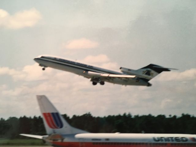 BOEING 727-200 (N767AT) - Taking off from Fort Myers.  Taken during the mid 1990s.