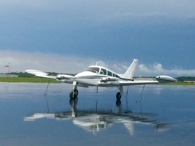 Cessna 310 (N2920R) - Ready to fly, rain or shine.