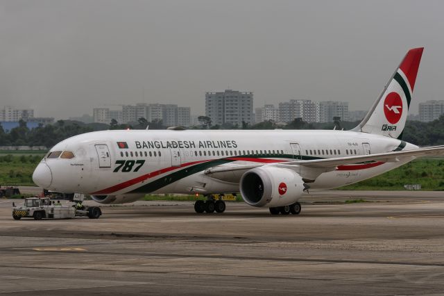 Boeing 787-8 (S2-AJU) - 28th August, 2024: "Rajhongsho" (Bangla for 'swan') being towed to the gate for departure to King Fahd International Airport in Dammam as flight BG 349. Close inspection of forward fuselage shows that the sticker of tyrant mujib has been removed following the popular overthrow of his fascist daughter hasina on 5th August, 2024.
