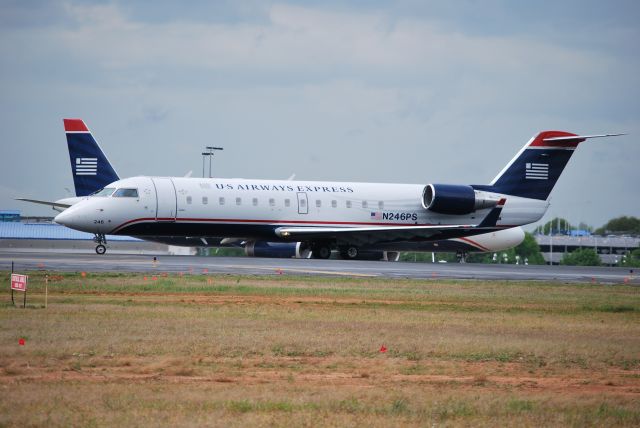 Canadair Regional Jet CRJ-200 (N246PS) - Taxiing into position 18L - 4/8/10