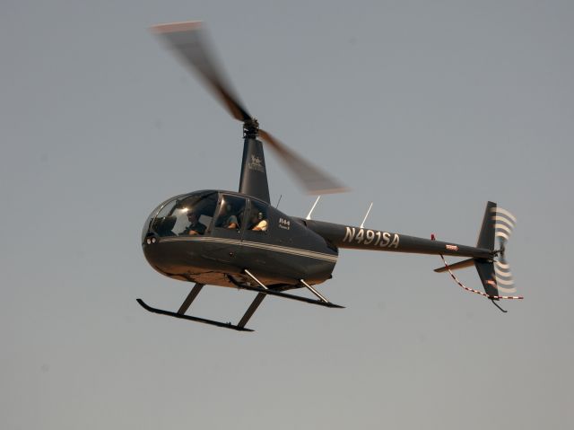 Robinson R-44 (N491SA) - Inbound for landing.