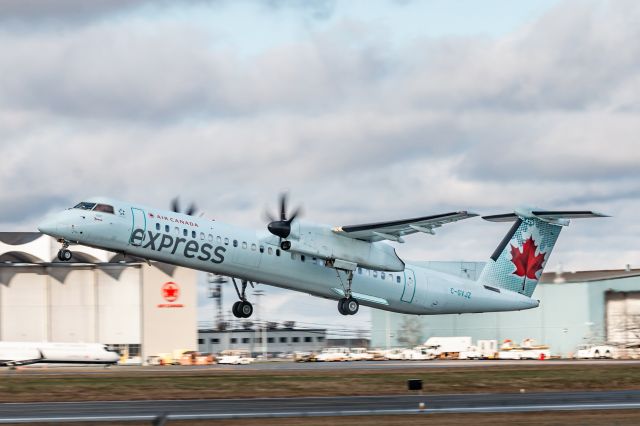 De Havilland Canada DHC-4 Caribou (C-GVJZ) - Jazz Q400 off to CYYT