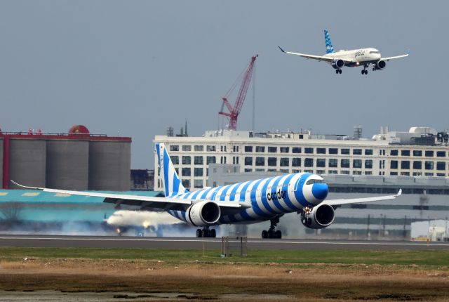 Airbus A330-900 (D-ANRF) - Dual landing at Logan - Condor A339 with Jetblue A220 along side.