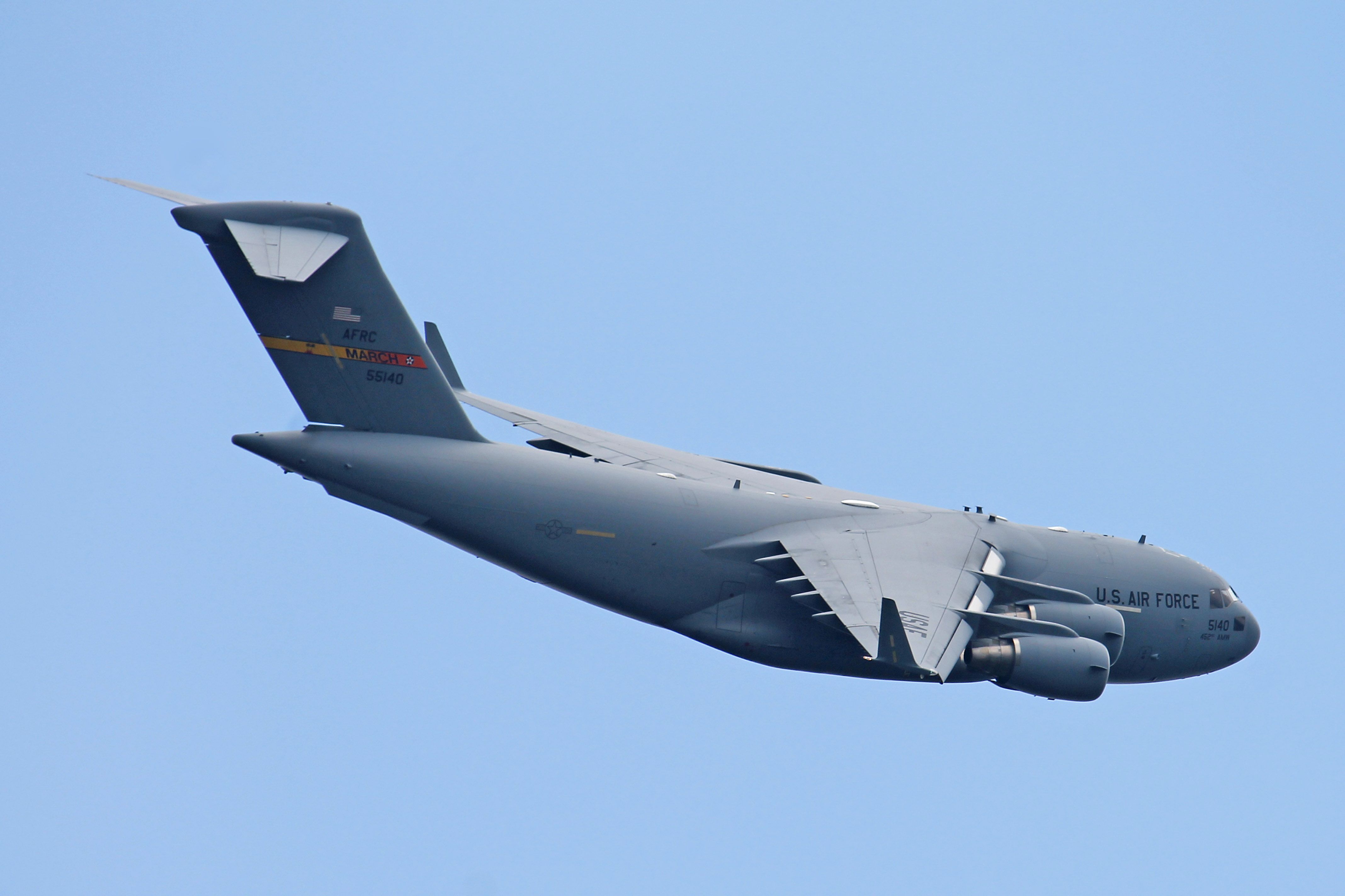 Boeing Globemaster III (05-5140) - A C-17 (05-5140, c/n P140) carrying fire apparatus passes over Sparta/Fort McCoy Airport before landing on 15 July 2013.