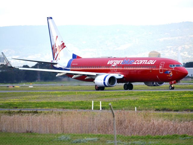 Boeing 737-800 (VH-VUZ) - On taxi-way heading for take off on runway 05. Thursday 12th July 2012.