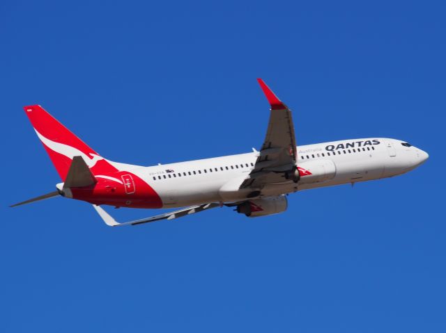 Boeing 737-700 (VH-VXA) - Leaving Adelaide on Runway 23. Taken from the viewing area on Tapleys Hill Road.