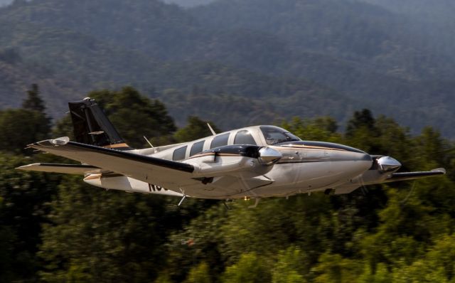 Beechcraft Baron (58) (N958P) - Low Pass